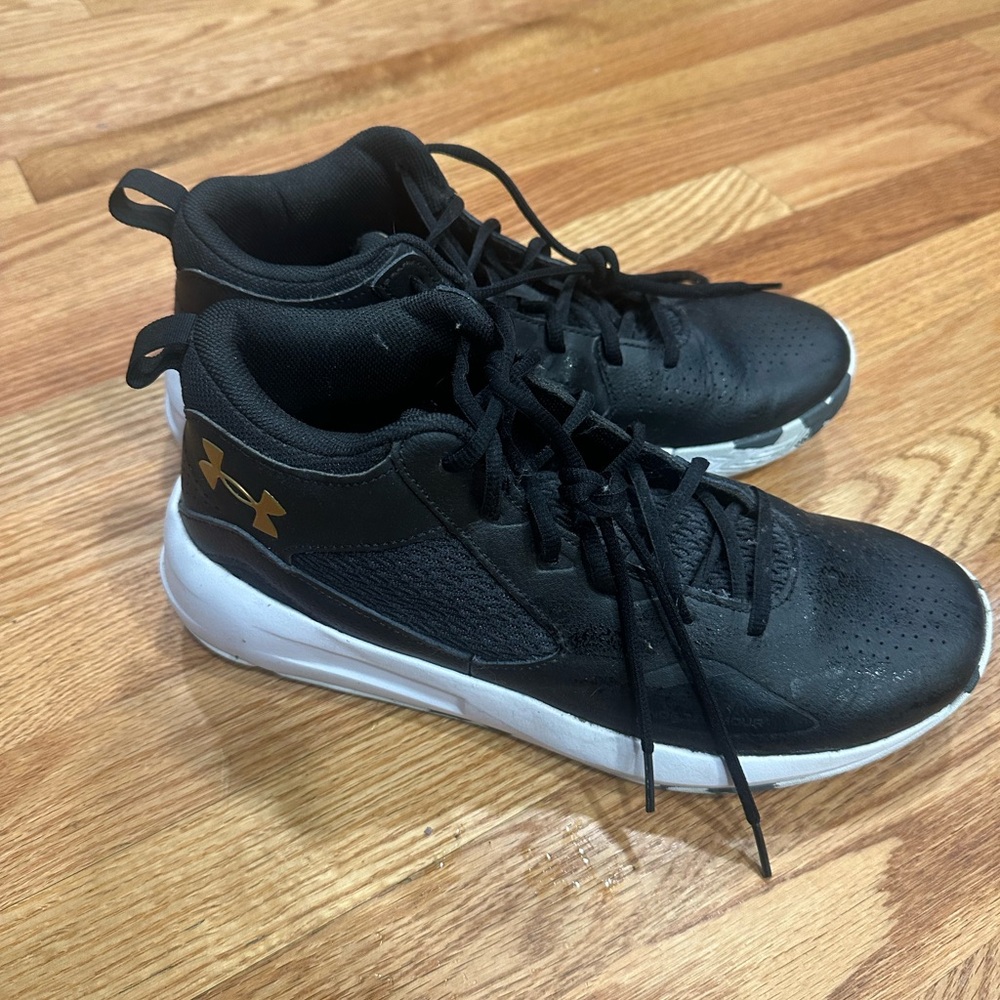 Under Armour Black Sneakers with Gold Logo